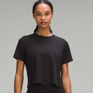 Lululemon Ultralight Waist Length T-Shirt in Black Size 6